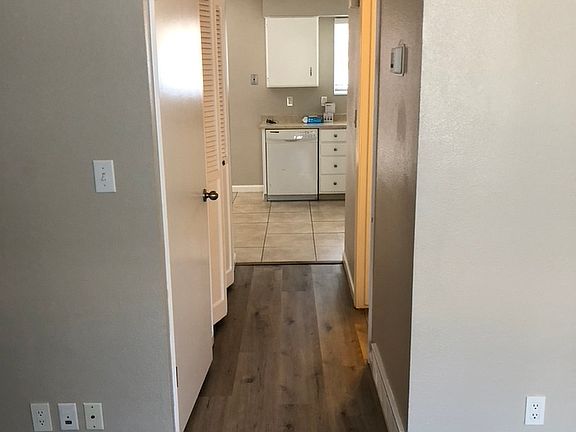 Main floor hallway to kitchen and 1/2 bath.