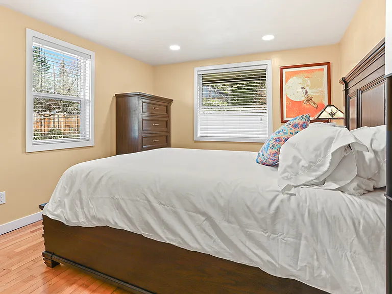 Master Bedroom, left window faces north, right window faces east.