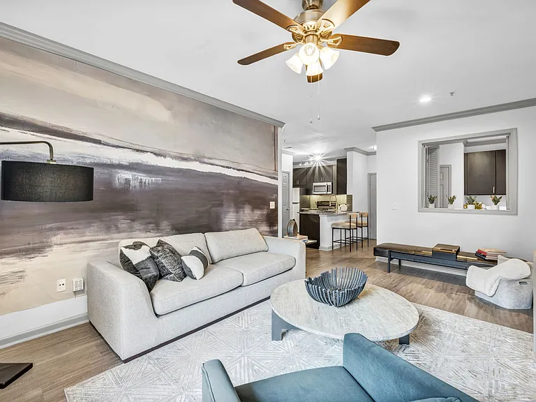 One bedroom - living room with wood-style flooring