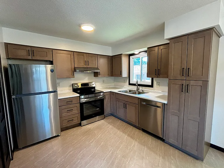 New stainless appliances and kitchen.