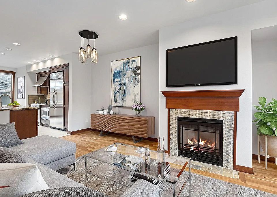 Living room with gas fireplace and media nook. (second floor)