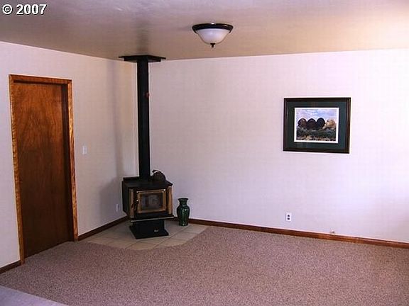 family room with wood stove