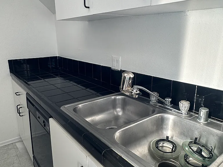 Double Sink Kithcen with ample cabinets