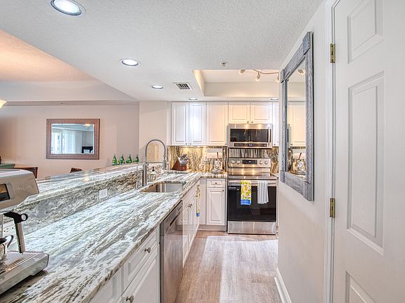 3rd image of 4650 Links Village Dr Unit B202