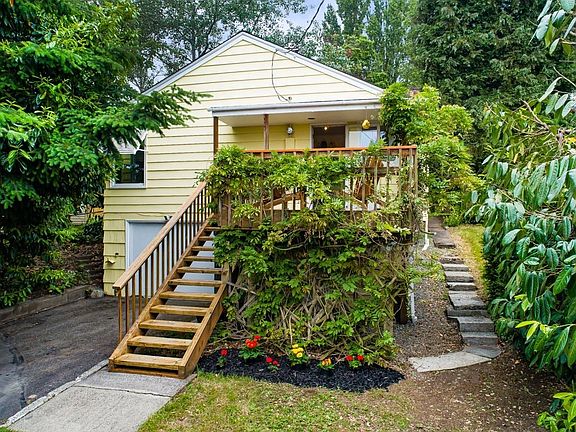 The back of the cottage faces west, toward Lake Washington, and offers a deck that bakes in the sun.