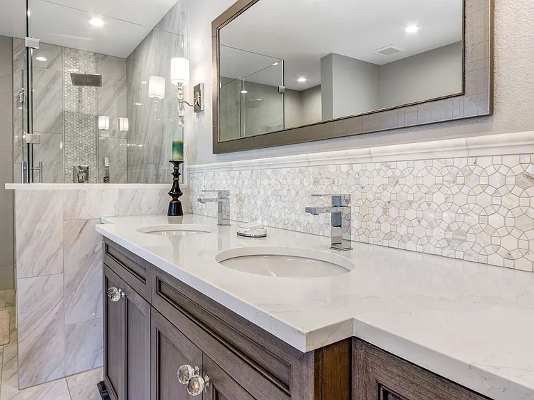 The master bath was completely redesigned, expanded and it took the general contractor months of labor and more than $60,000 in expense