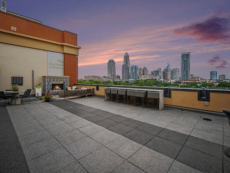 The community terrace has THE best views of the Uptown skyline, two fire places, a new grill and bar, and TVs. Perfect for hosting, can be rented through the HOA for private events