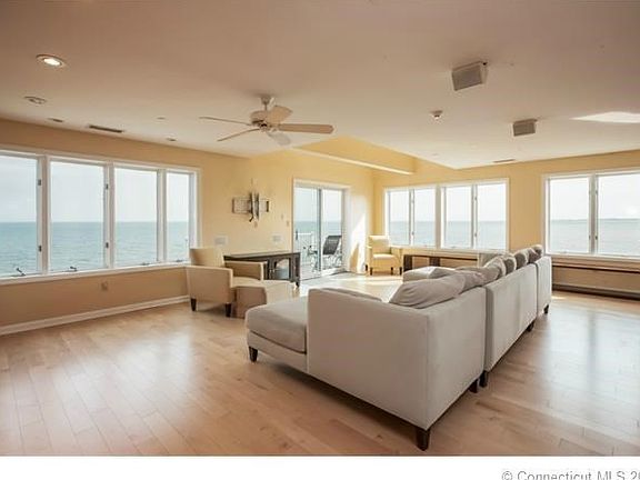 Living room with sliders to the deck