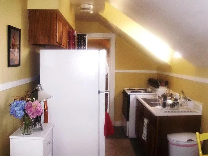 Kitchen w/ Stove & Refrigeratr