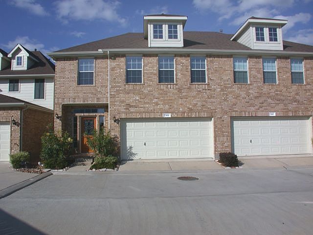 Townhouse with tons of upgrades!  No front neighbors, extra parking, gated!
