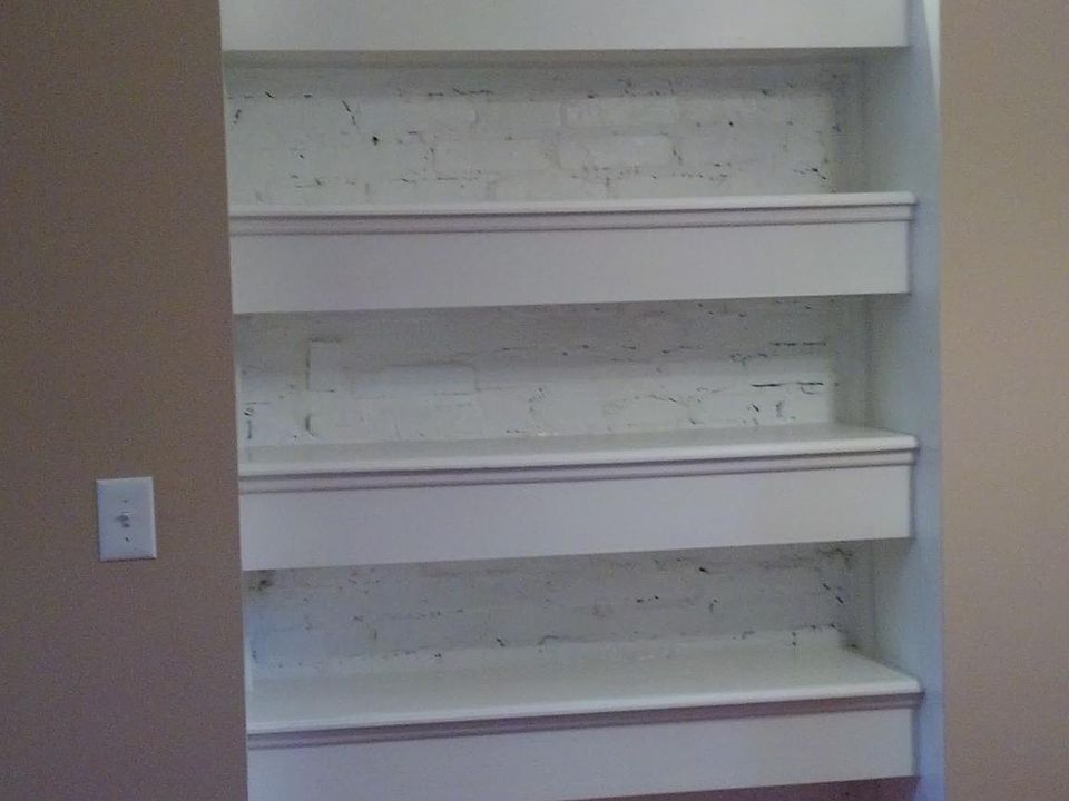 Built in lighted bookshelf in main living area