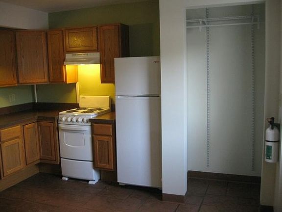 Closet, located between kitchen area and front door.