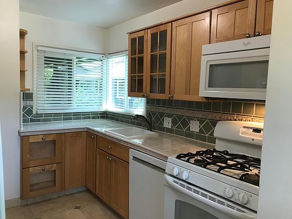 Remodeled kitchen with gas stove