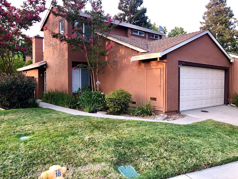 Front Walkway and Attached Garage