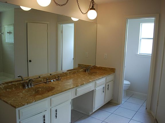 Master bath with large double lavatory.