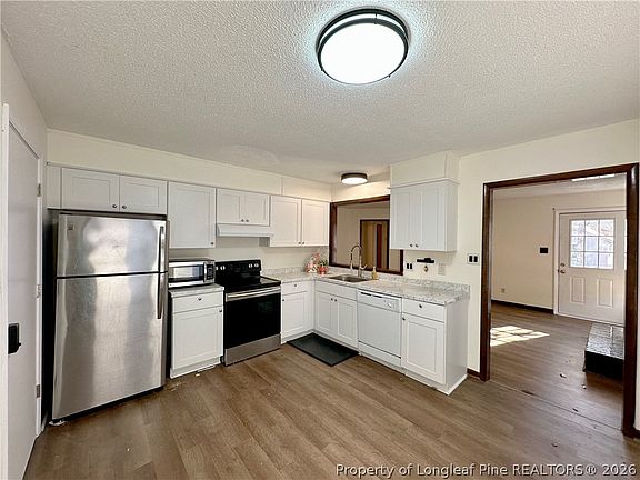 2nd image of 6031 Harmon Pl