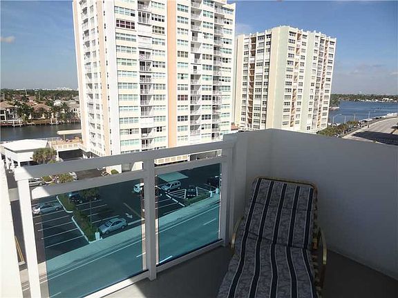 PANORAMIC WATER VIEWS FROM THIS 2BED/2BATH CORNER UNIT STEPS FROM THE BEACH
