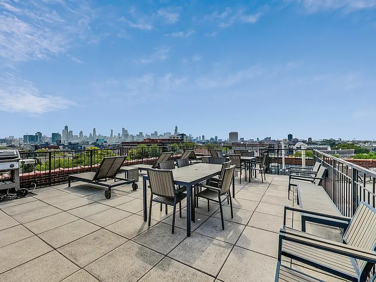 Shared roof deck with the downtown skyline