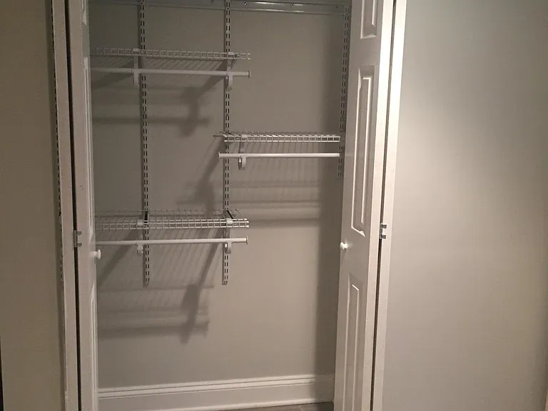 1 of 2 large closets in bedroom