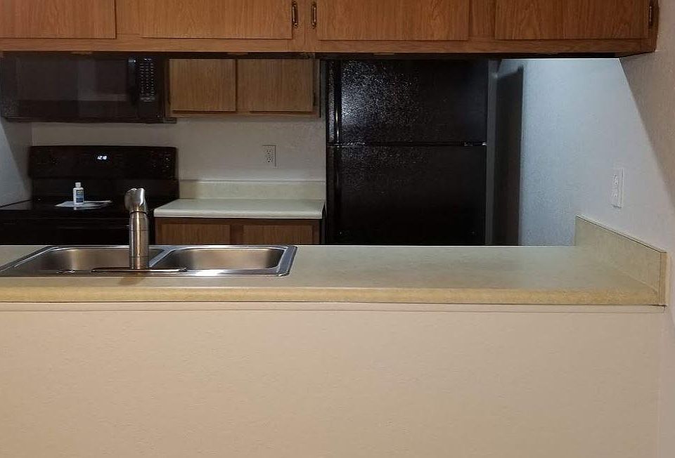 1st image of 6234 Village Green Cir APT 12