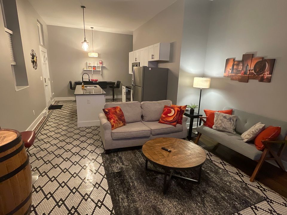 Open concept with the original tiled floor.