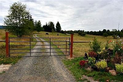 Sitting well off Smith Rd these gates welcome you to a peaceful setting.