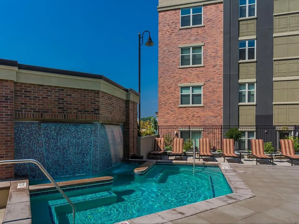 Unwind and relax in an outdoor hot tub open year-round!