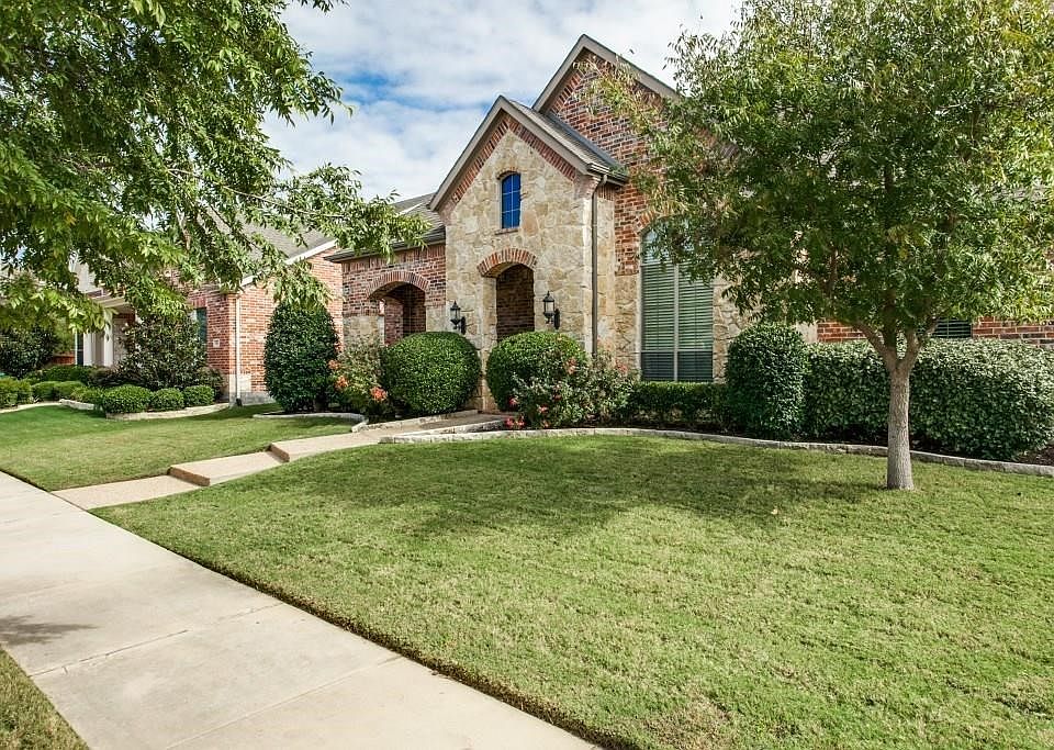 Beautiful Highland Home, with veranda style front porch. Hard to find 1.5 story home with all bedrooms on one level!  Mature landscaping, lovely curb appeal!