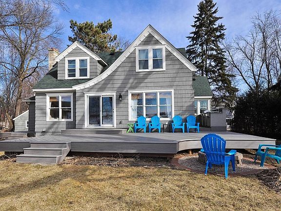 Views of lakeside. Notice new expansive maintenance free deck!