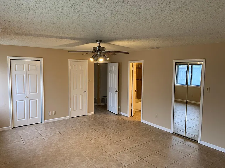 Spacious master bedroom with sitting area, dedicated bathroom, with 3 closets (one walk in, one linen)