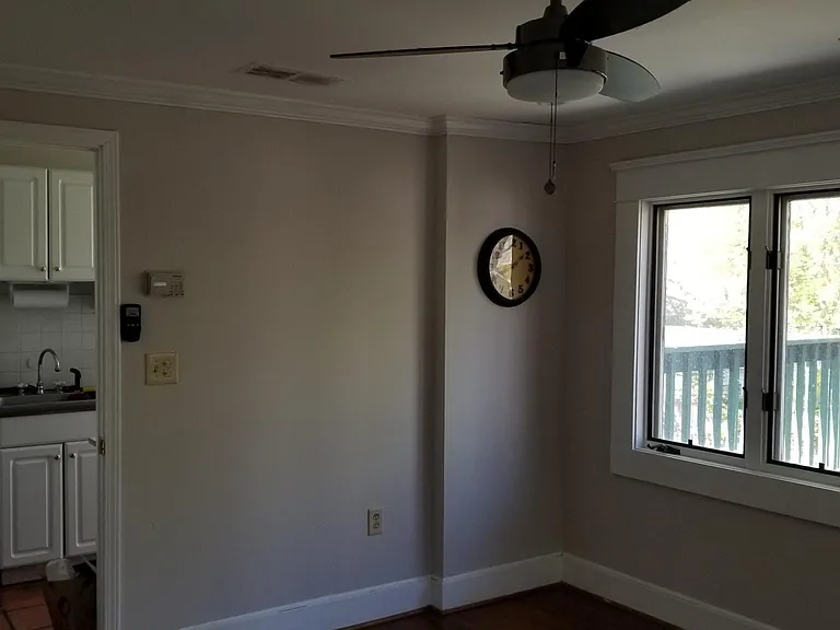 Living Room view into Kitchen(Room is still this color)