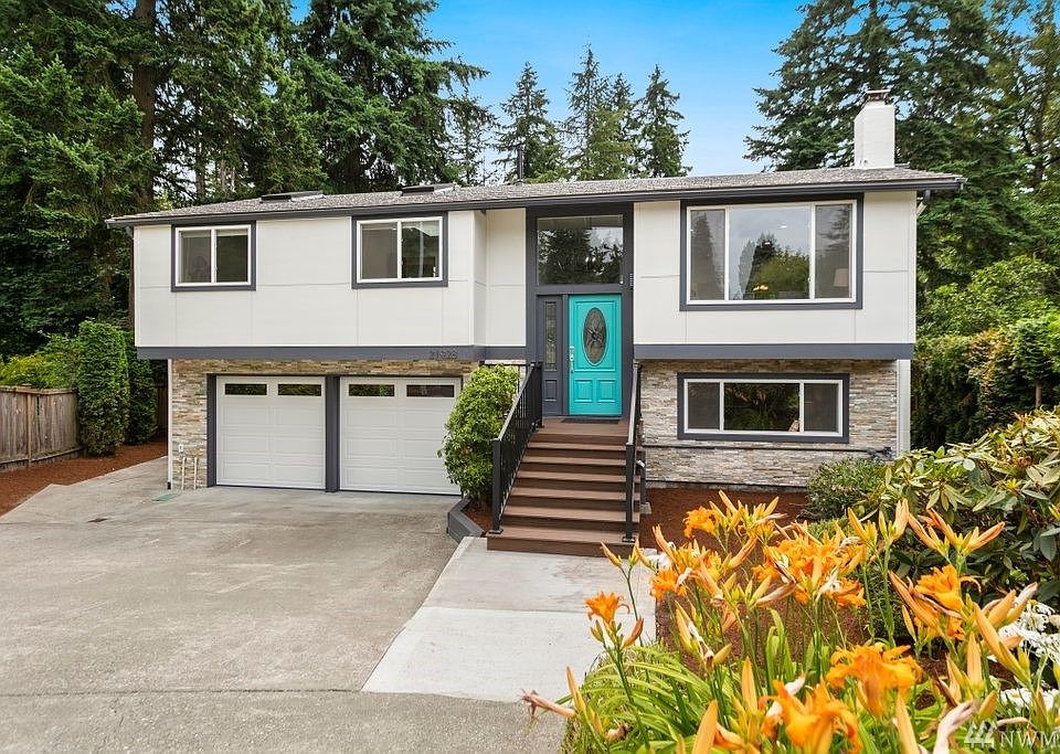 Modern front finish, lifetime roof , RV parking 3 car tandem garage.