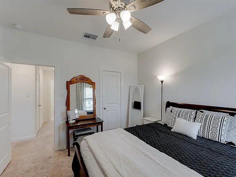 A view of bedroom 3, looking out towards the hallway