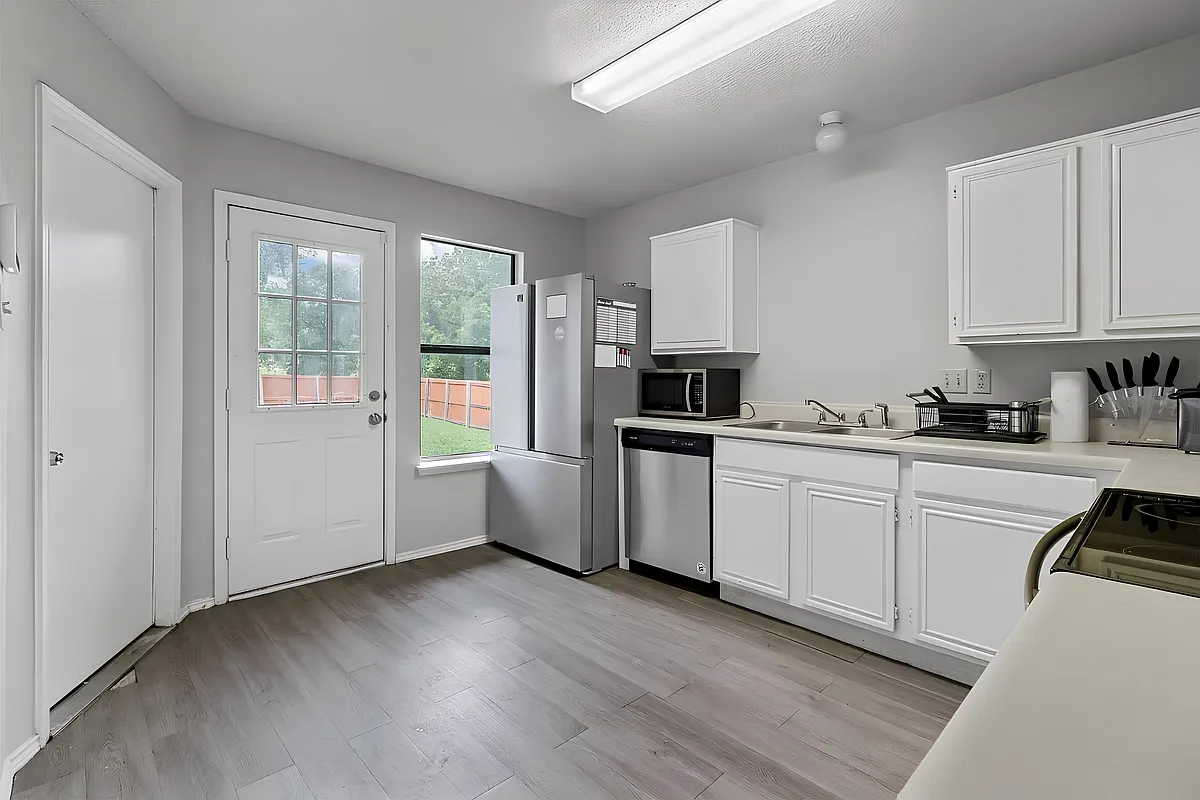 Kitchen area full - Hilltop Dr