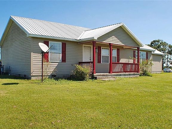 The home has a new metal roof, one year old air conditioning system, and  new water pump