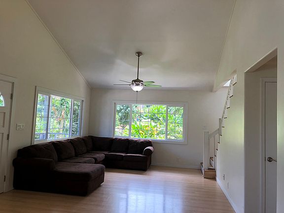 Large downstairs living room with high-vaulted ceilings 