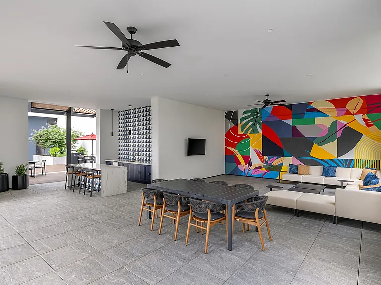Courtyard greenspace connected to outdoor kitchen