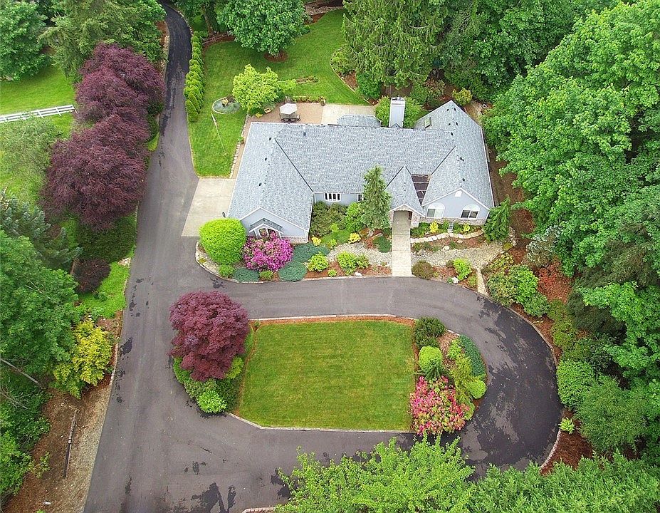 Gorgeous home is sited on a beautifully landscaped, private and serene 1.1+ acre lot. 