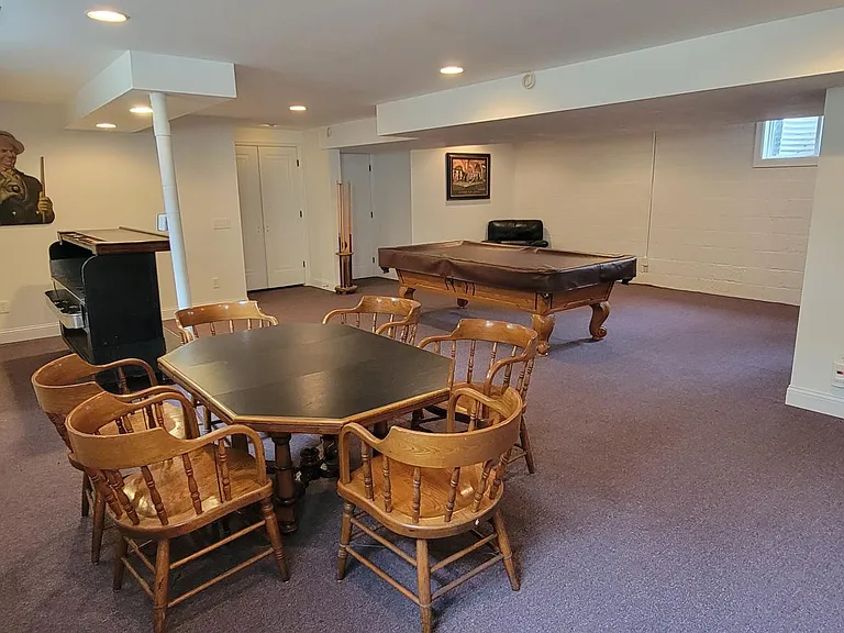 Poker table and chairs, bar, pleather chair, and artwork can be removed from this room. Pool table must stay in place. It cannot be moved even in the slightest unless you have written permission from the owner. It costs around $600 just to have it profess