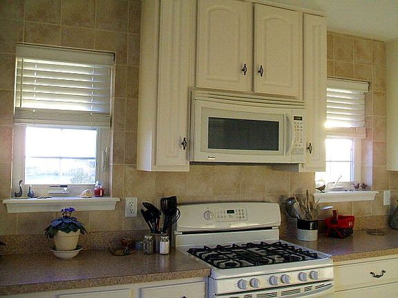Five burner gas range with griddle attachment with two adorable  windows...who