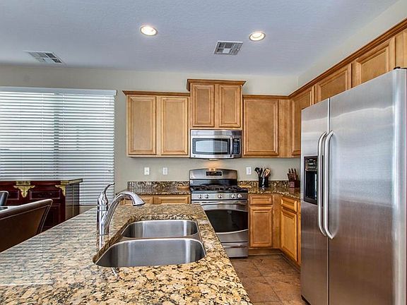 2nd image of 14582 W Port Royale Ln