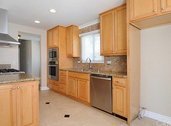 Remodeled kitchen with granite counters, stainless apps and new cabinets