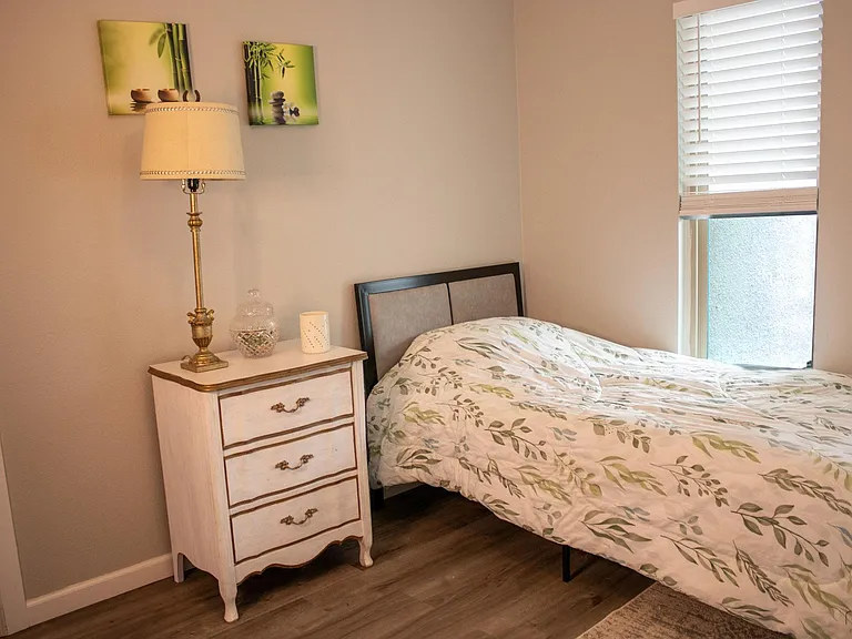 Comforty bed with nice window that brings natural light