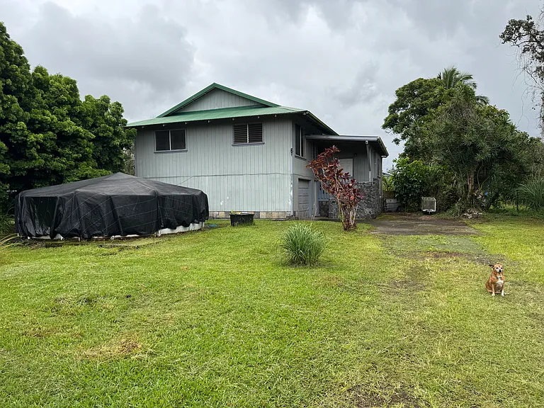 Home is set back quite a way from the street