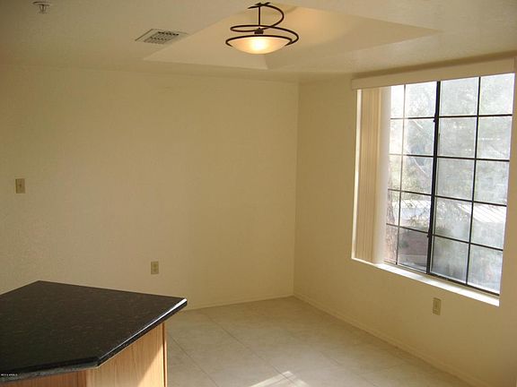5th image of 9690 N 94th Pl Unit 218
