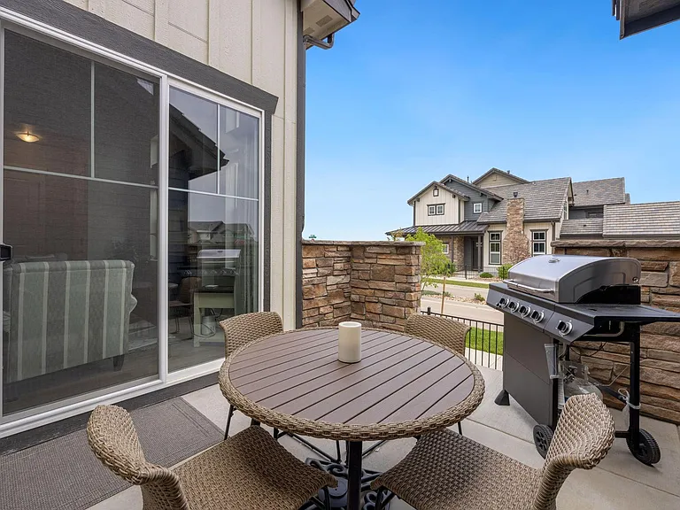 Patio outside of living room with outdoor grille and heater for cool nights!