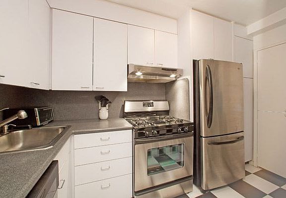 Kitchen with full size stainless steal appliances