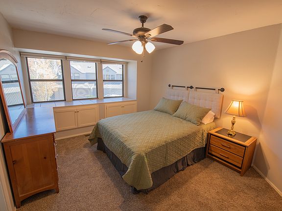 Primary Bedroom with Window Seat and Built-in Storage.