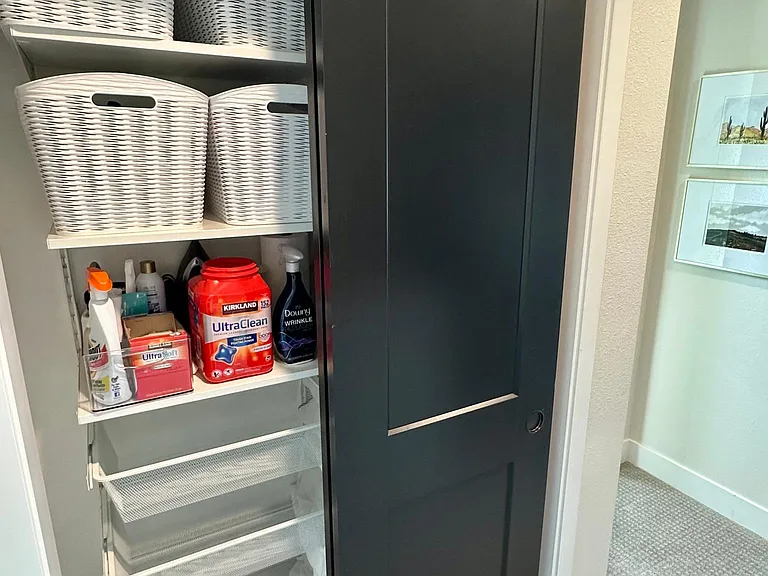 Sliding hallway closet with new shelving system (drawers and shelves) for extra storage and linens