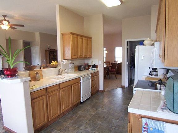 galley style kitchen with pull out shelves